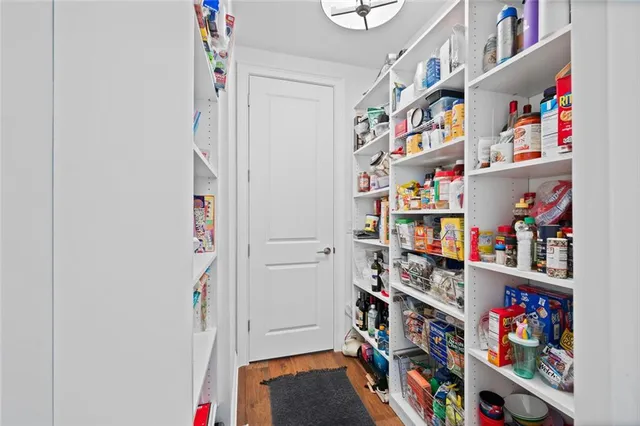 a room with storage and utility room