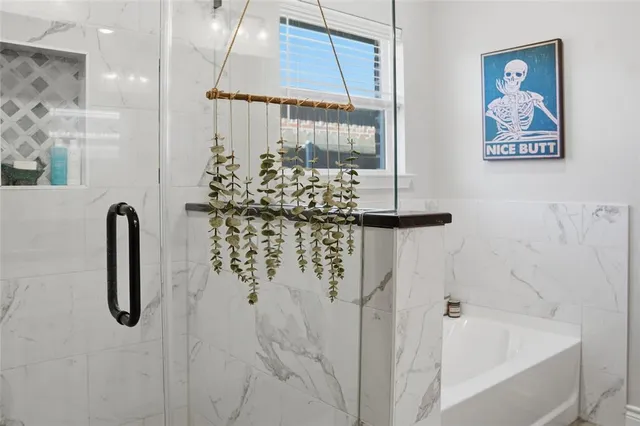 a bathroom with double sink and a mirror