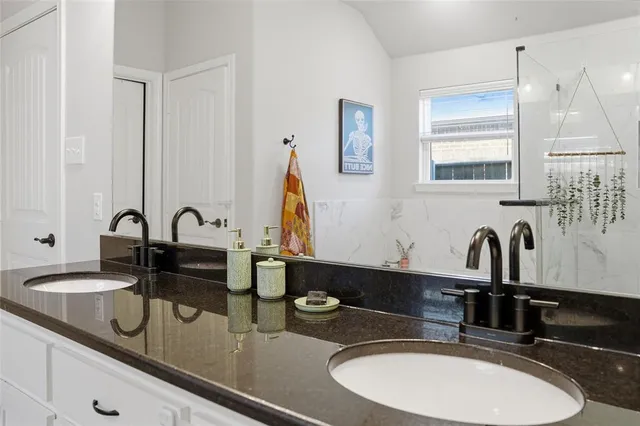 a view of a workspace with furniture