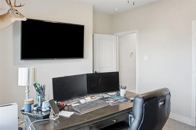 a view of walk in closet with mirror
