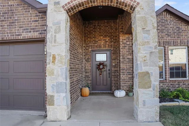 a front view of a house with patio