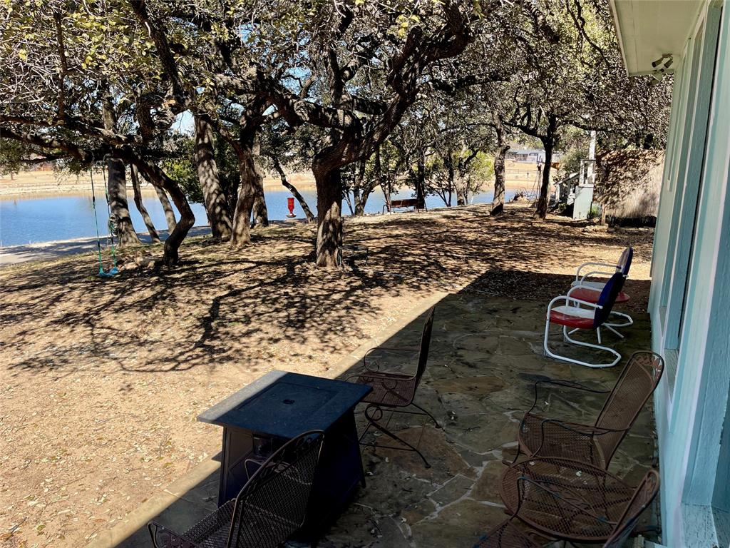 2334 San Bar Road, Unit 50 Graford, TX 76449 - Photo 7 of 40 a view of a backyard with sitting area