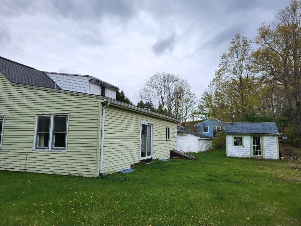 144 Washington Road Brimfield, MA 01010 - Photo 3 of 21 a view of a house with a yard