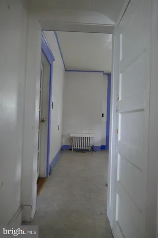 a view of a room with an empty space