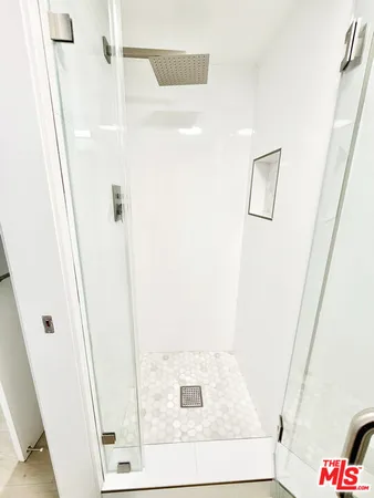 a bathroom with a tub and sink