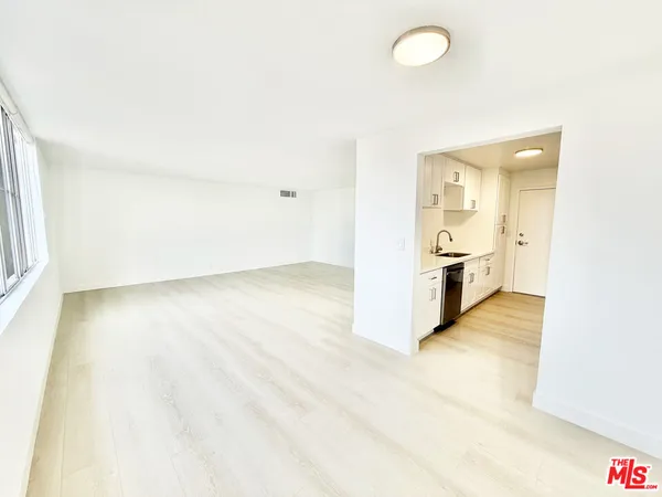a view of kitchen and a sink