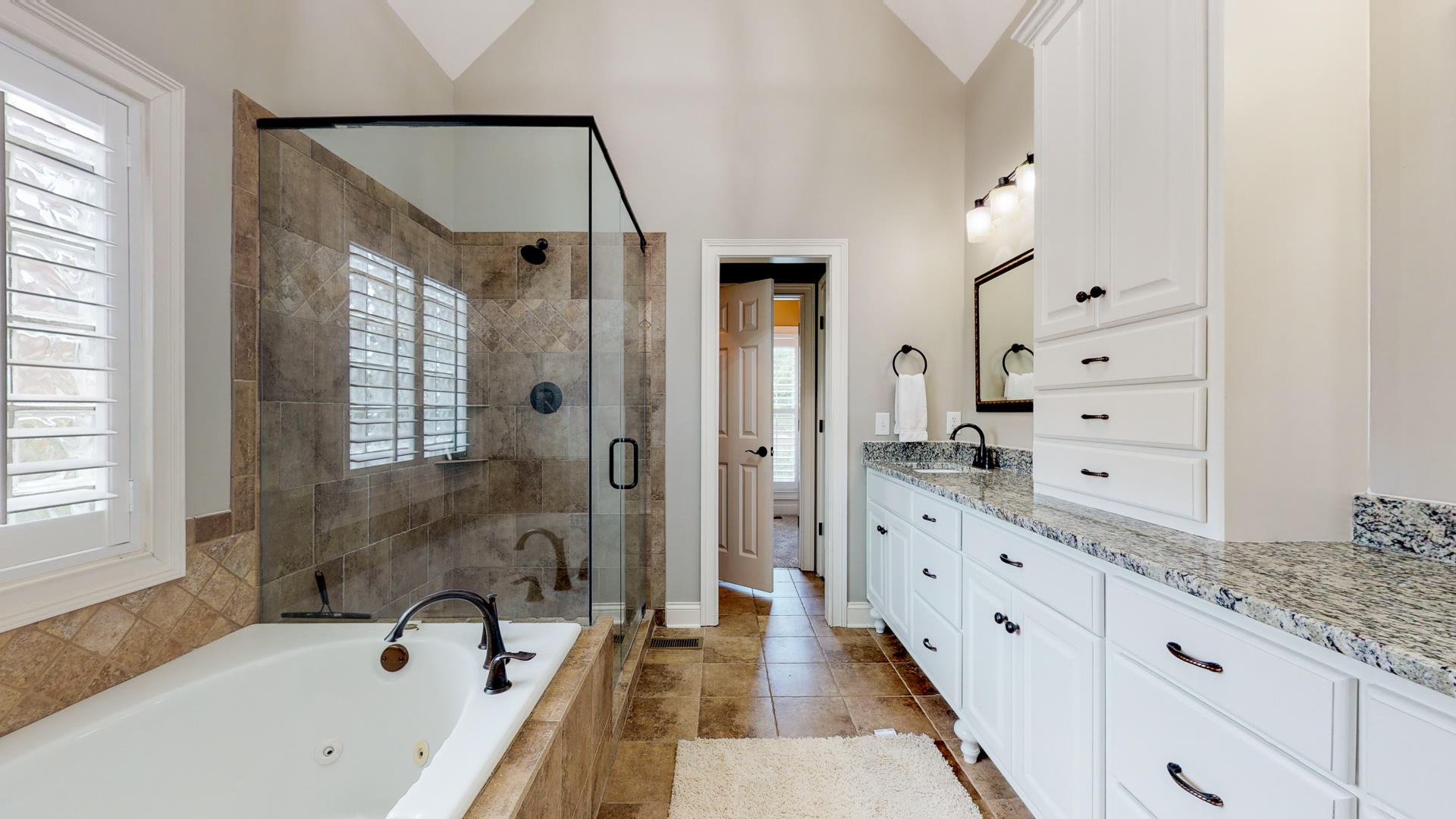 5337 Sherrington Road Murfreesboro, TN 37128 - Photo 14 of 30 En suite bath with large frameless shower, whirlpool tub.