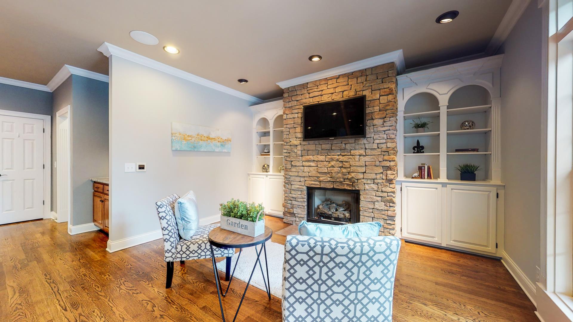 5337 Sherrington Road Murfreesboro, TN 37128 - Photo 7 of 30 Cozy stone fireplace with built-ins!