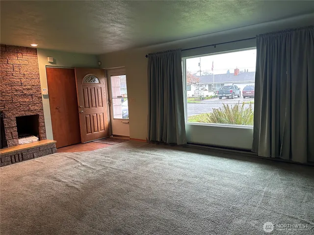 an empty room with windows