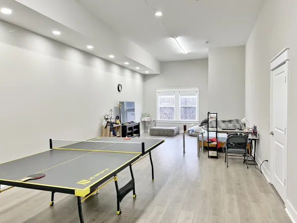a living room with furniture and a table