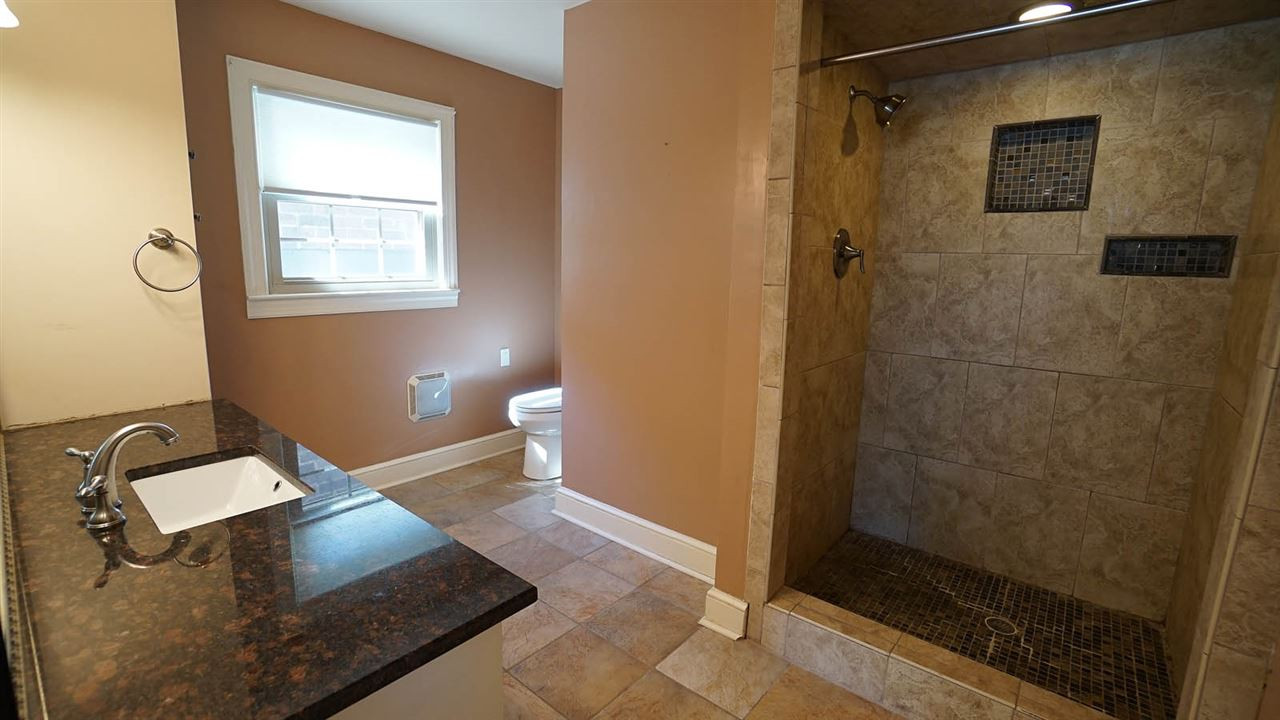 1421 Lynn Road Raleigh, NC 27612 - Photo 16 of 30 Remodeled in 2013-granite counters, tile floors, walk in shower. Master Bathroom