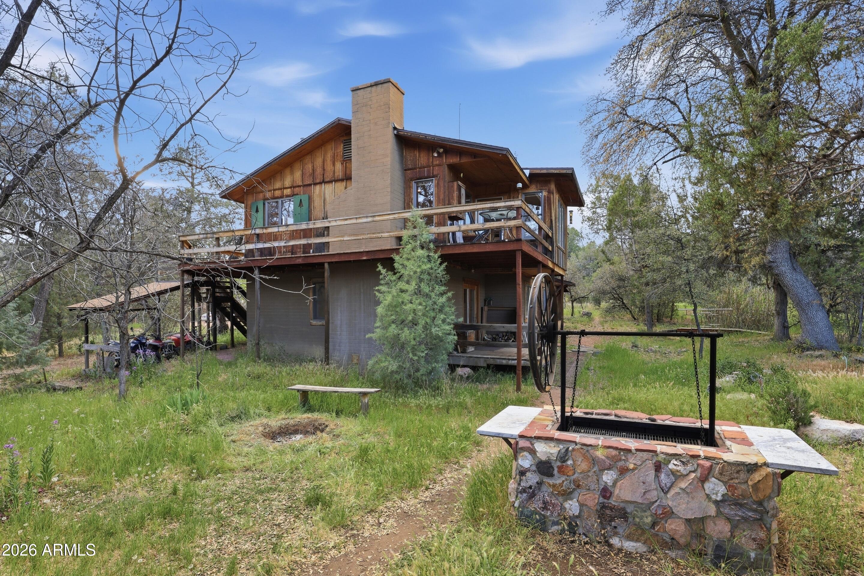 8135 West Gibson Ranch Road Payson, AZ 85541 - Photo 25 of 43 a view of a house with a yard