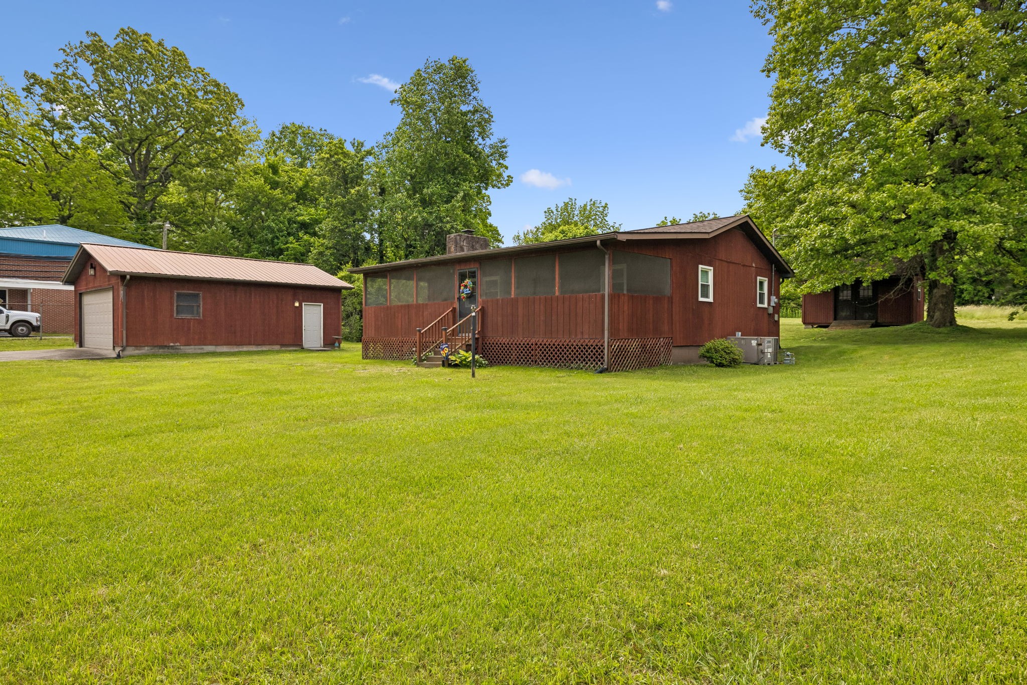 115 1st Street Monteagle, TN 37356 - Photo 1 of 22 a view of a yard with a house