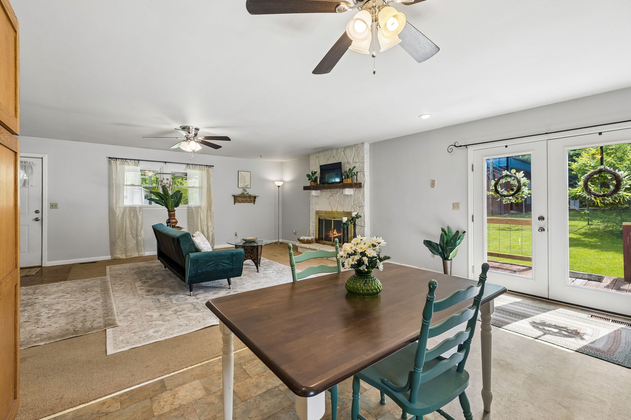 115 1st Street Monteagle, TN 37356 - Photo 10 of 22 a view of a dining room with furniture a chandelier and wooden floor