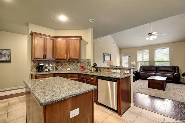 a kitchen with granite countertop lots of counter top space