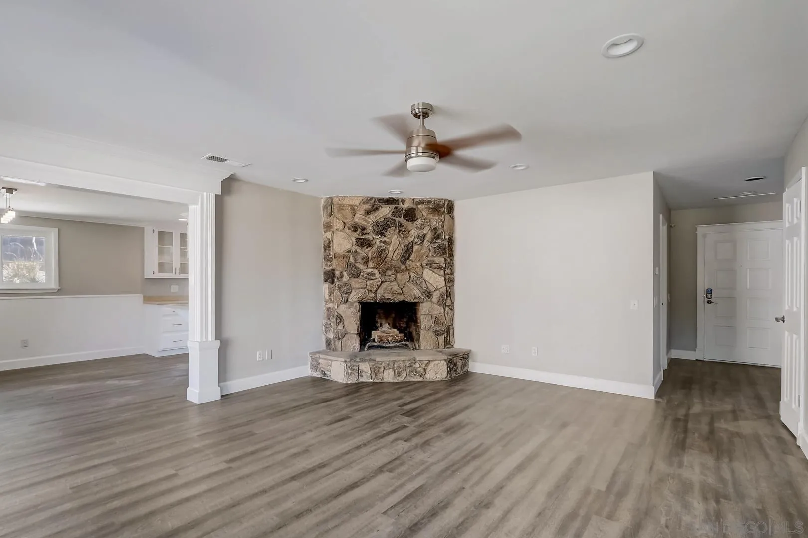220 Shetland Way Fallbrook, CA 92028 - Photo 13 of 24 a view of a livingroom with a fireplace and window
