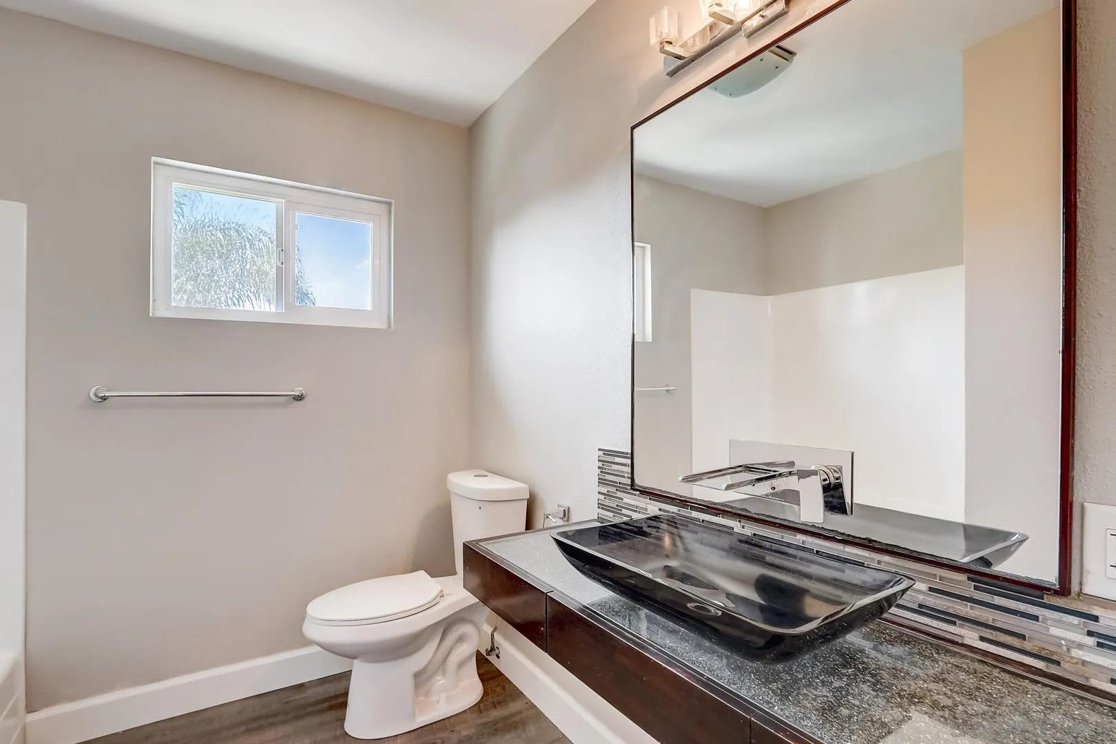 220 Shetland Way Fallbrook, CA 92028 - Photo 19 of 24 a bathroom with a toilet and a sink