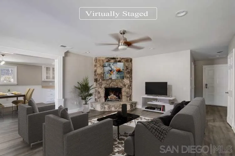 220 Shetland Way Fallbrook, CA 92028 - Photo 2 of 24 a living room with furniture a fireplace and a flat screen tv