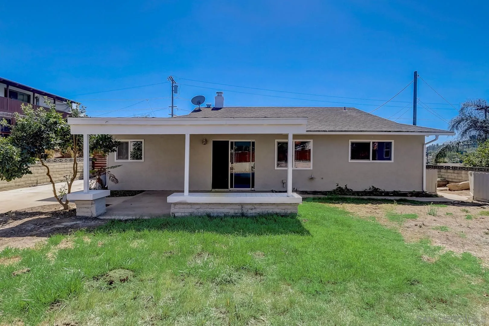 220 Shetland Way Fallbrook, CA 92028 - Photo 23 of 24 a front view of a house with a garden