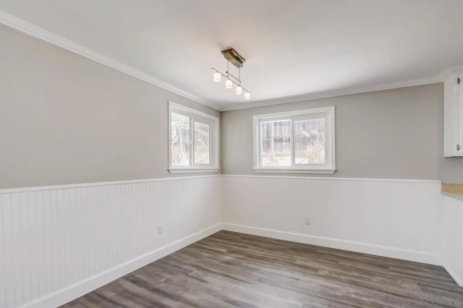 220 Shetland Way Fallbrook, CA 92028 - Photo 5 of 24 wooden floor in an empty room with a window