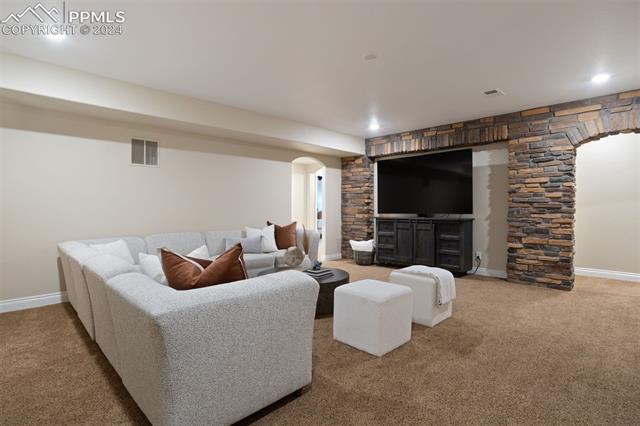 778 Cumberland Road Larkspur, CO 80118 - Photo 16 of 31 Lower level recreation room