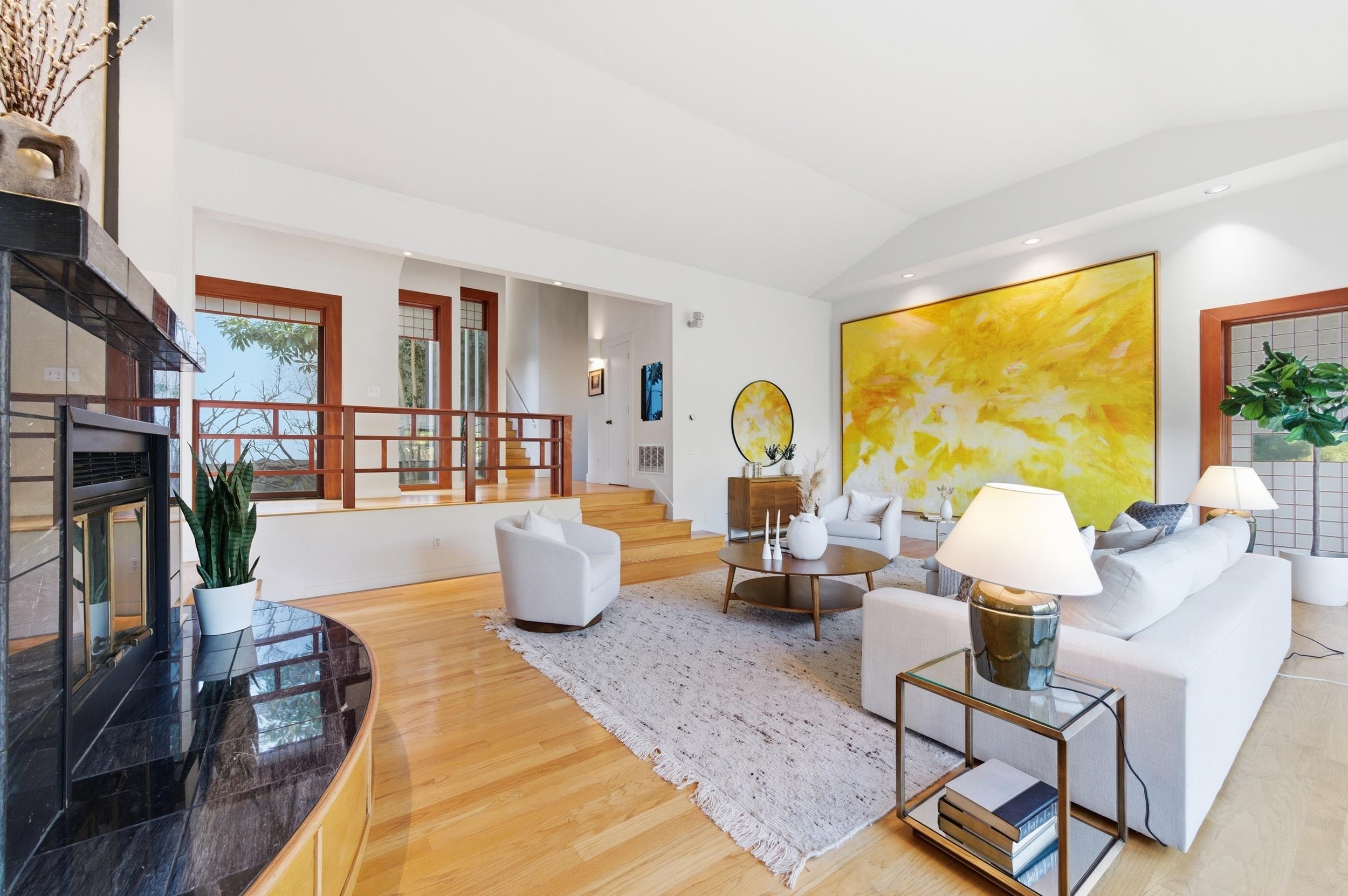 271 Monte Vista Ridge Road Orinda, CA 94563 - Photo 11 of 59 Living room featuring lofted ceiling, wood finished floors, a glass covered fireplace, and recessed lighting