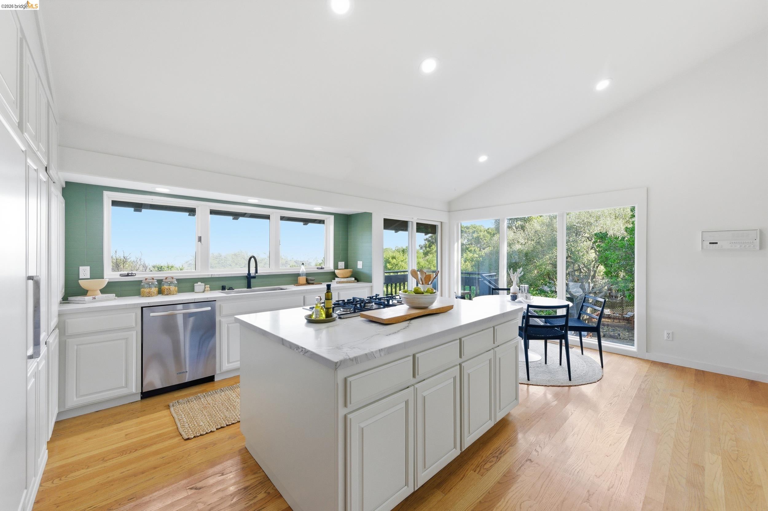 271 Monte Vista Ridge Road Orinda, CA 94563 - Photo 16 of 59 a kitchen with a sink stove and wooden cabinets