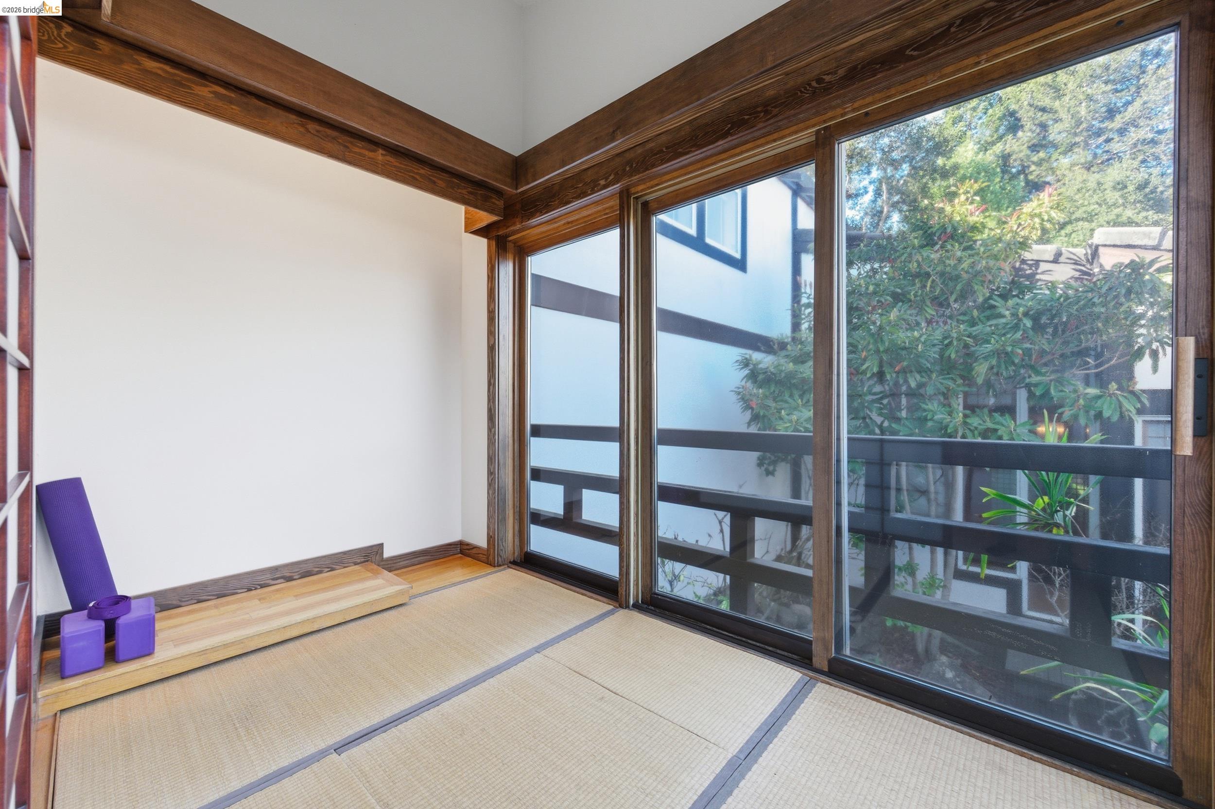 271 Monte Vista Ridge Road Orinda, CA 94563 - Photo 21 of 59 a bedroom with a bed and a large window with outer view