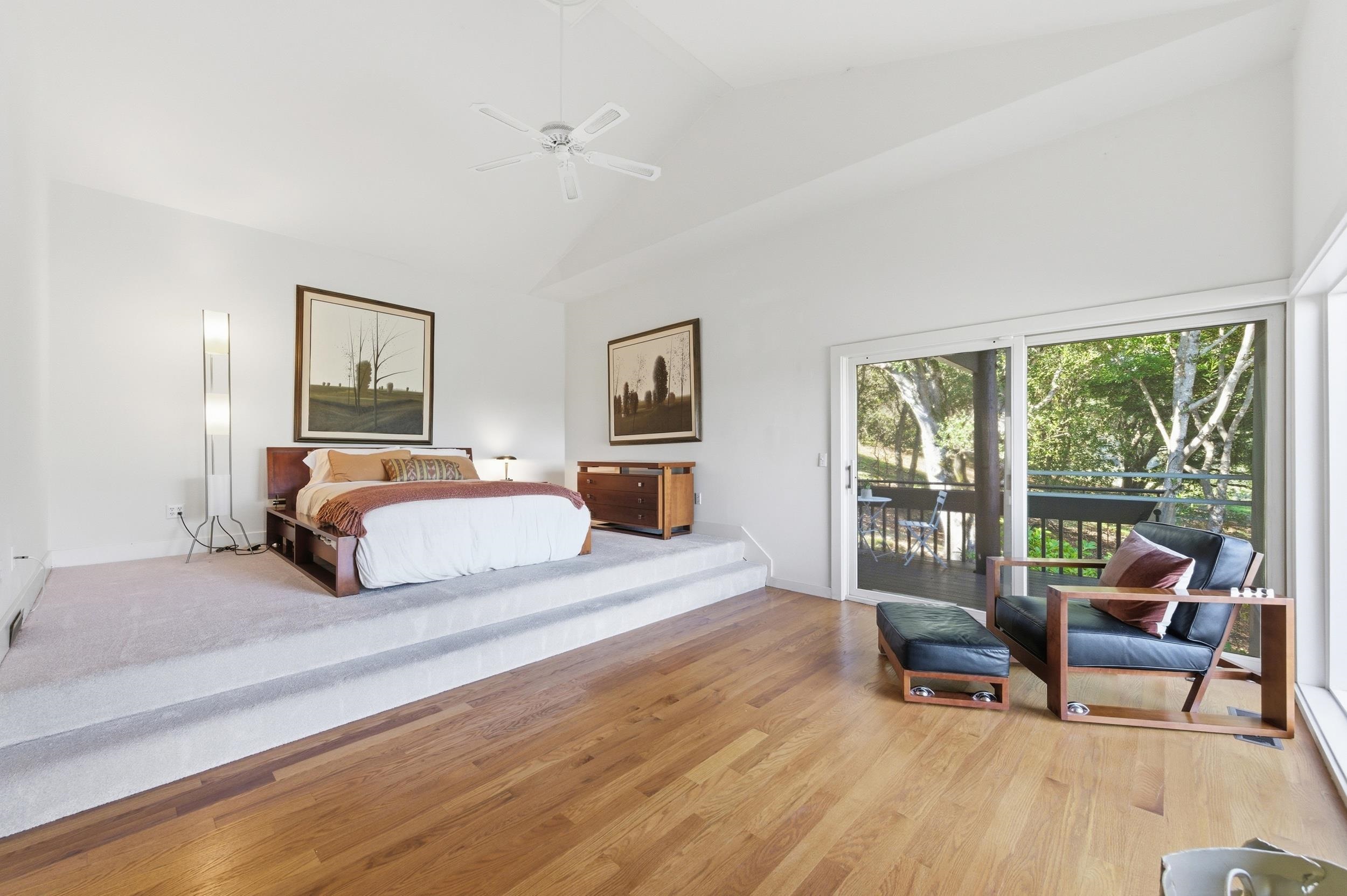 271 Monte Vista Ridge Road Orinda, CA 94563 - Photo 22 of 59 Bedroom featuring vaulted ceiling, access to outside, wood finished floors, and ceiling fan