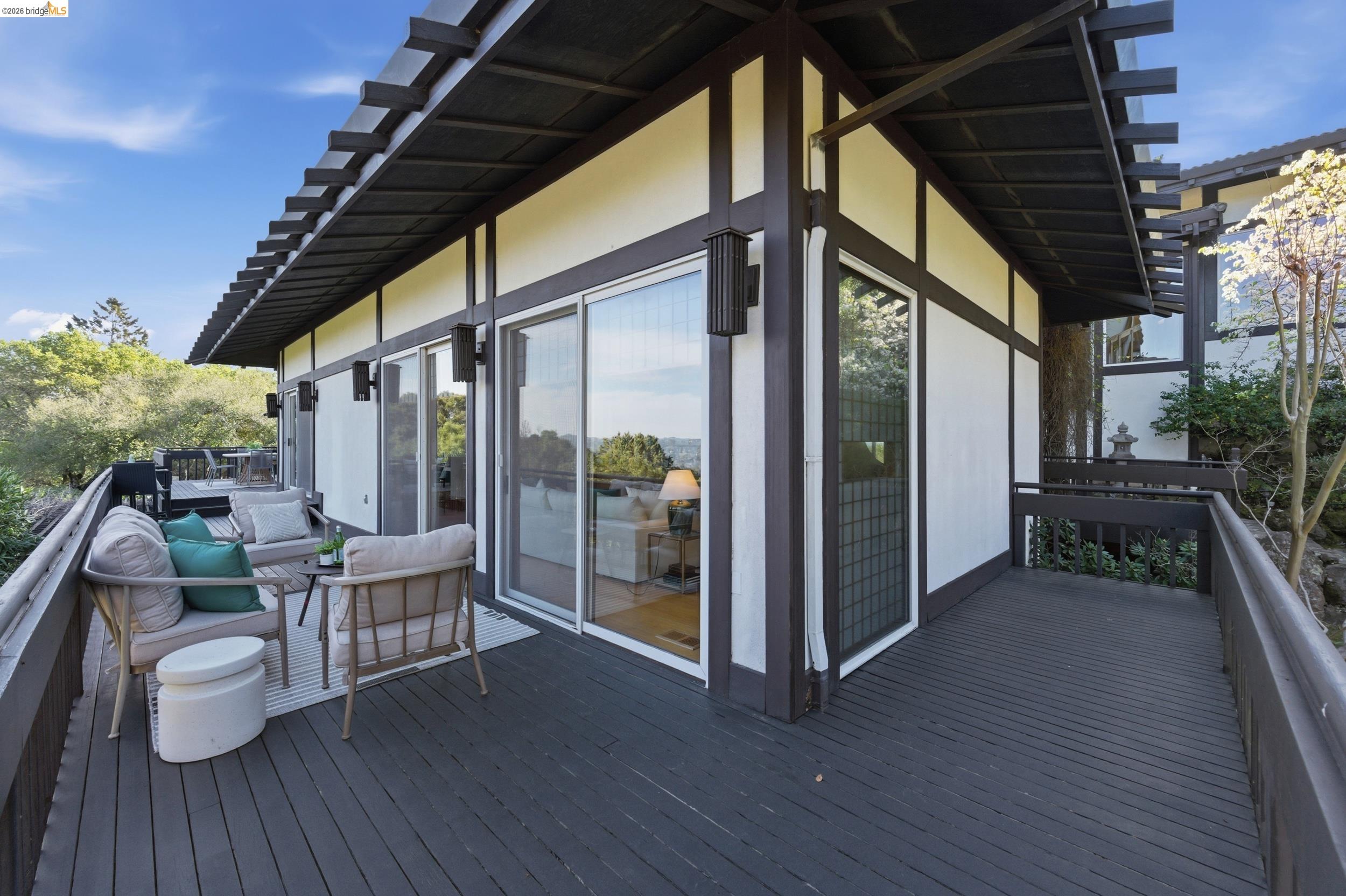 271 Monte Vista Ridge Road Orinda, CA 94563 - Photo 30 of 59 a patio with wooden floor and outdoor seating