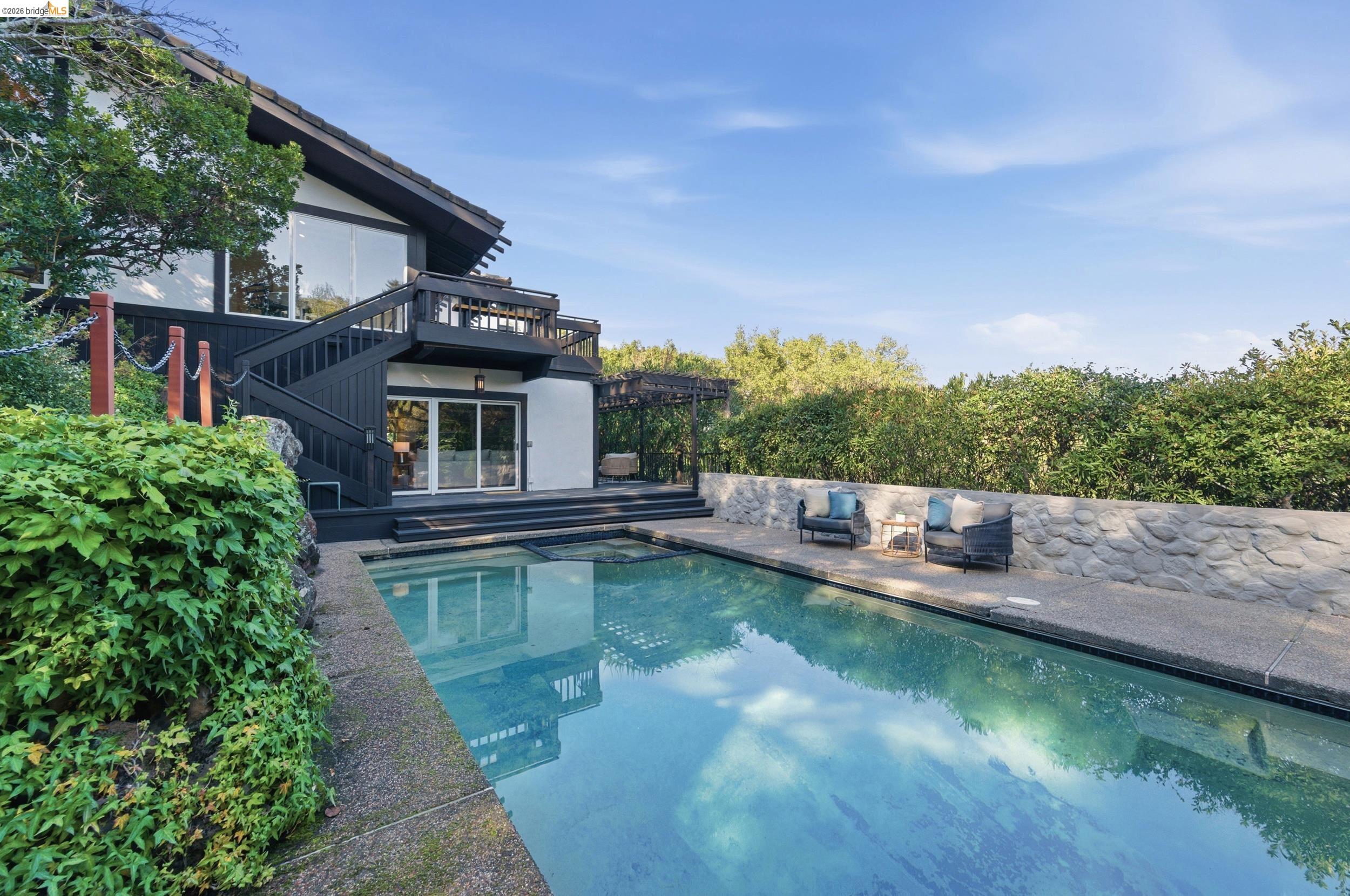 271 Monte Vista Ridge Road Orinda, CA 94563 - Photo 38 of 59 a view of a house with pool and sitting area