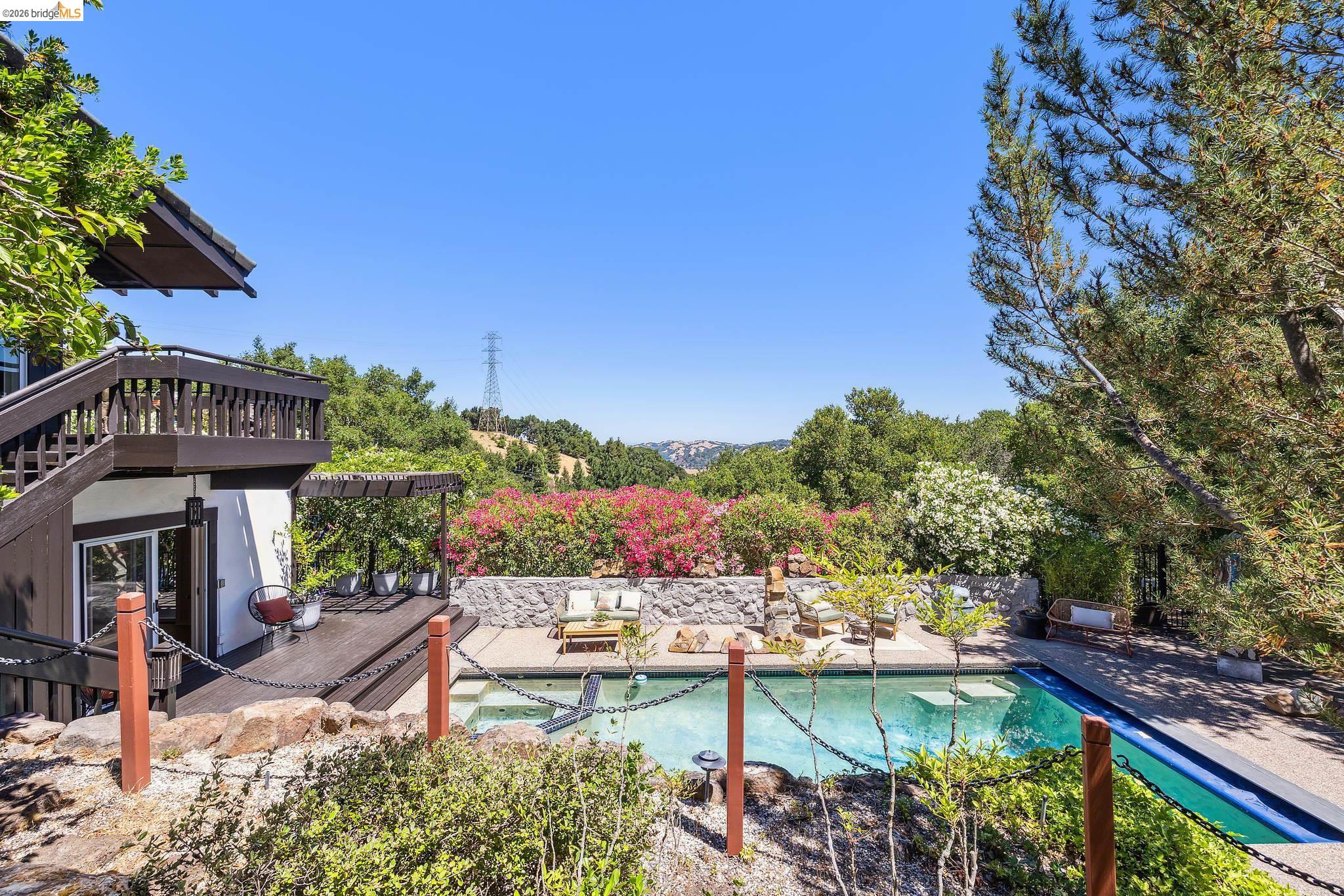 271 Monte Vista Ridge Road Orinda, CA 94563 - Photo 39 of 59 a view of a patio with couches table and chairs and potted plants