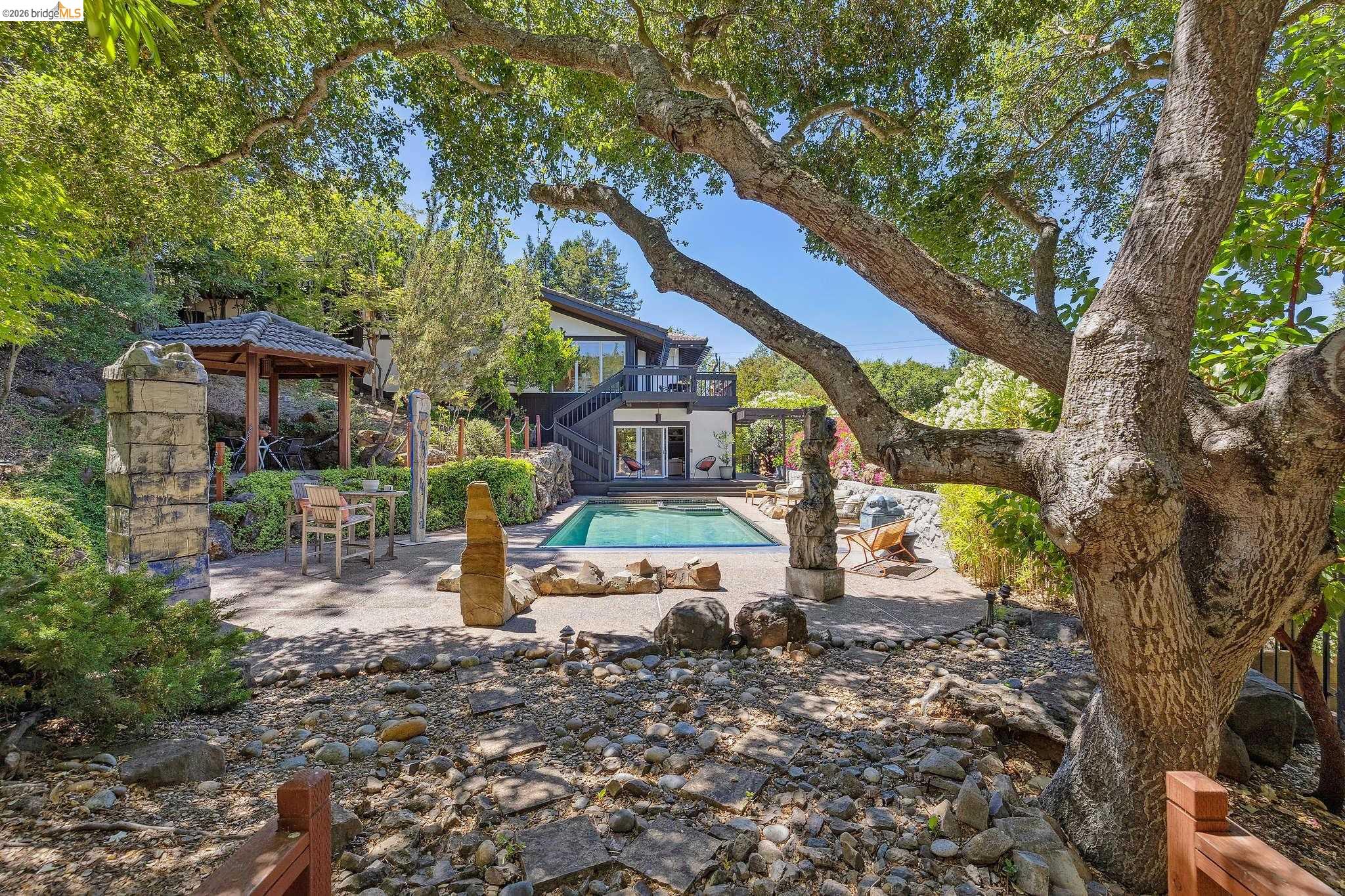 271 Monte Vista Ridge Road Orinda, CA 94563 - Photo 44 of 59 a front view of a house with garden