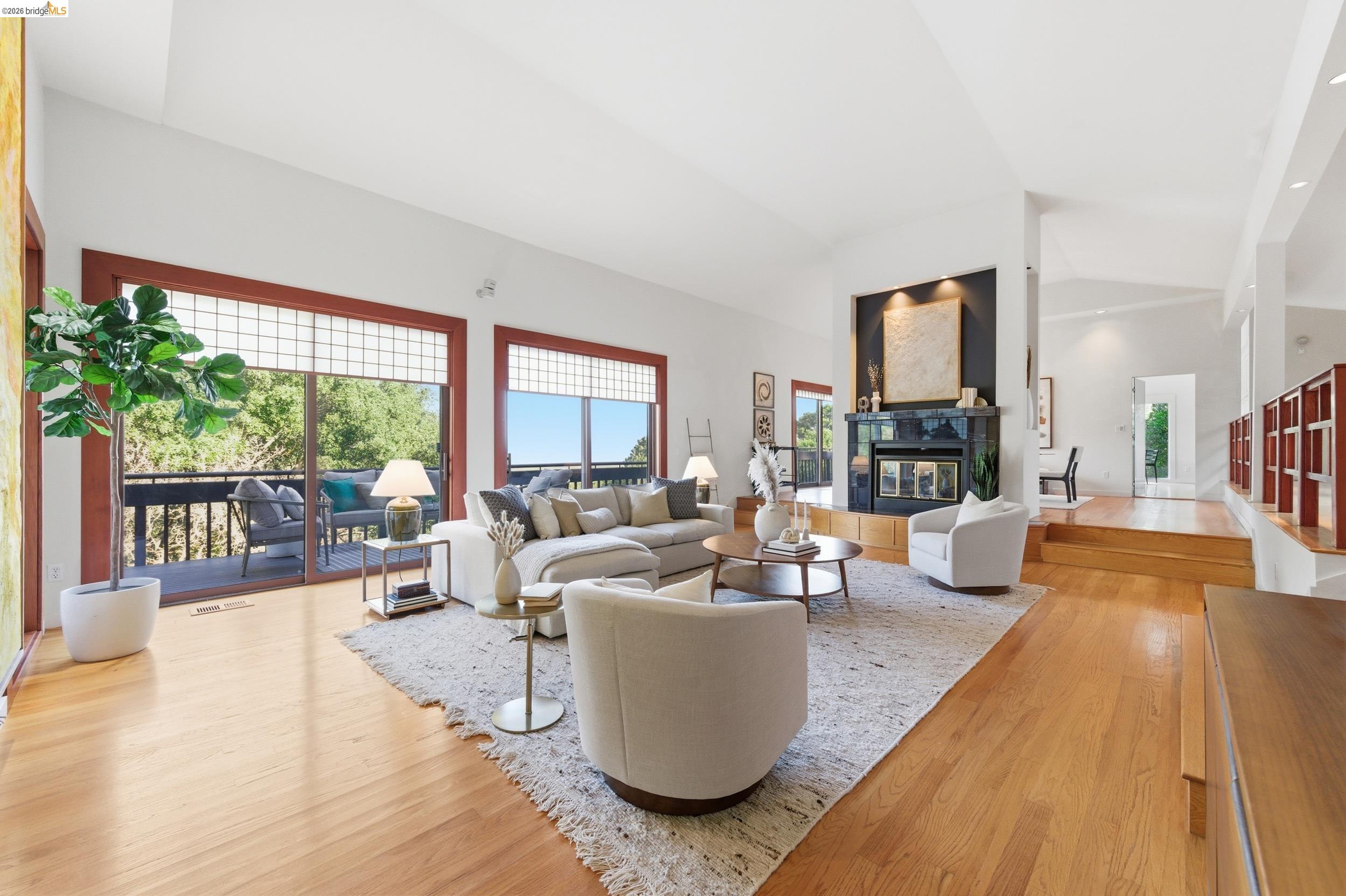 271 Monte Vista Ridge Road Orinda, CA 94563 - Photo 9 of 59 a living room with furniture and a large window