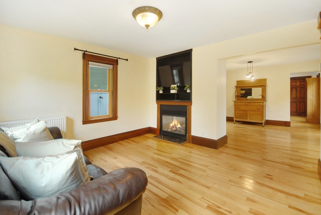 1832 Main Street Concord, MA 01742 - Photo 2 of 25 a living room with furniture and a wooden floor