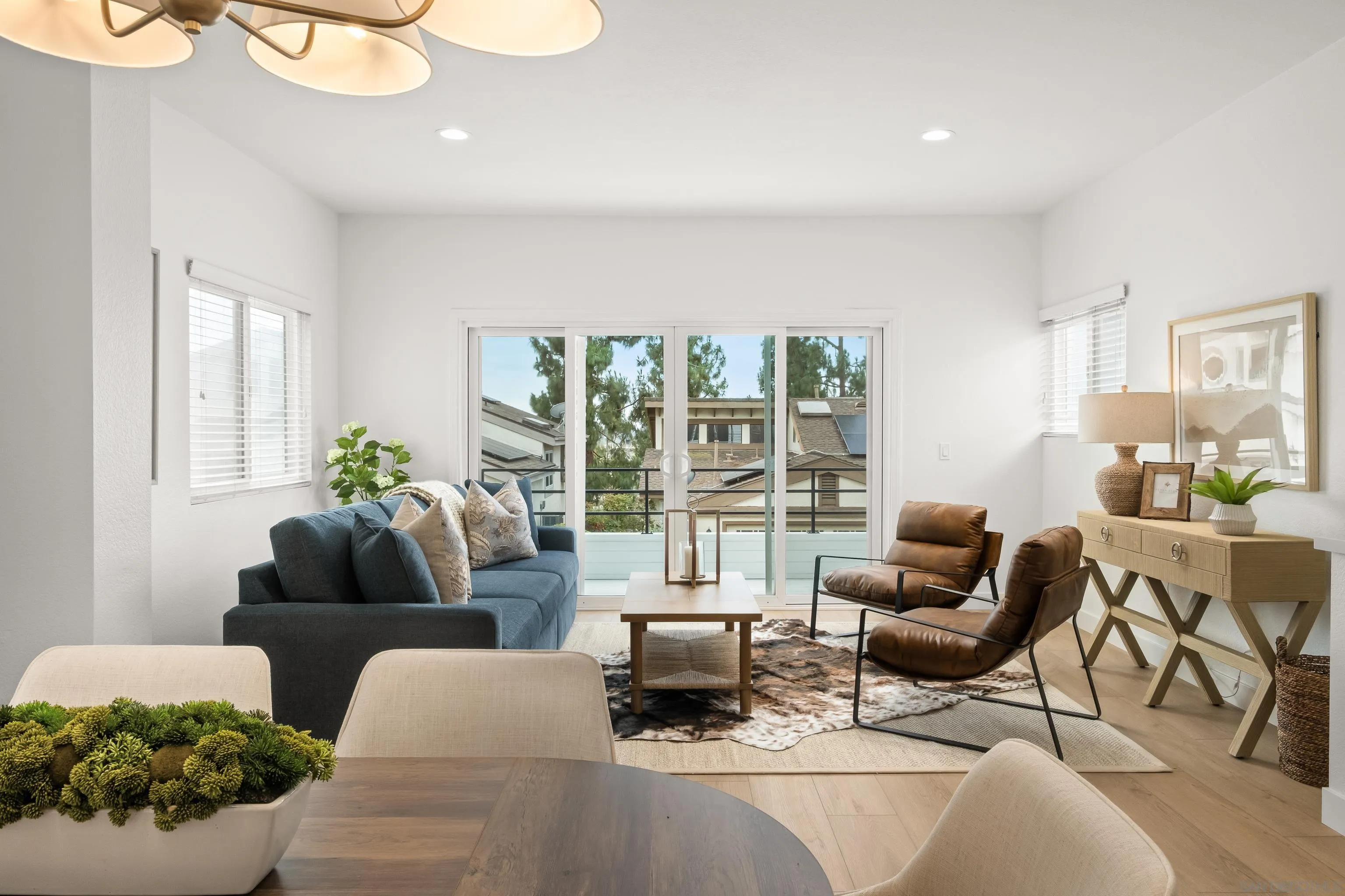 11478 Madera Rosa Way San Diego, CA 92124 - Photo 6 of 54 a living room with furniture and a large window
