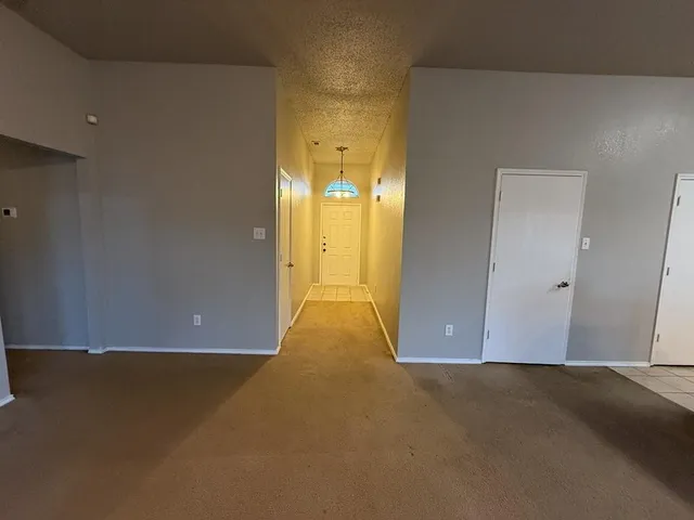 a view of a room with floor to ceiling window