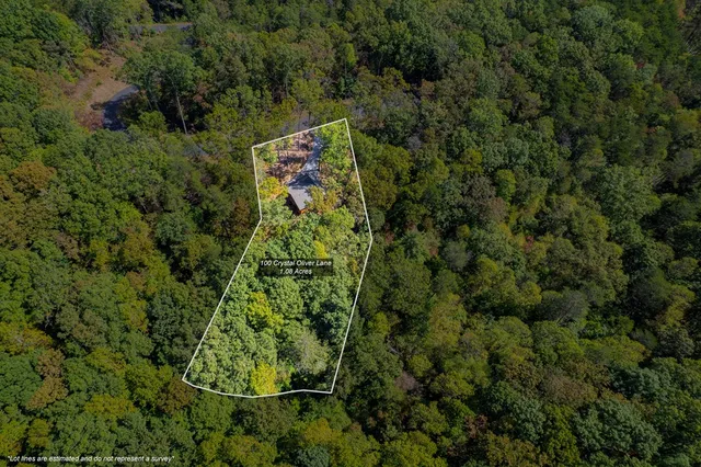 a sign that is sitting in front of a building