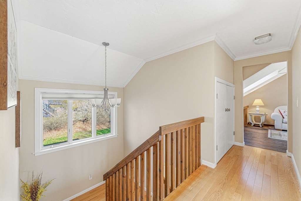 3 Heather Hill Road Acton, MA 01720 - Photo 14 of 33 a view of an entryway with wooden floor and a large window