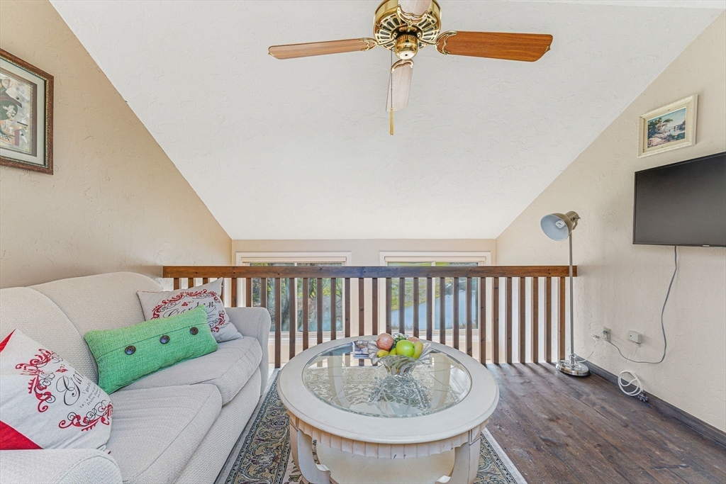 3 Heather Hill Road Acton, MA 01720 - Photo 16 of 33 a living room with furniture and a table
