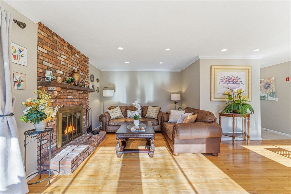 3 Heather Hill Road Acton, MA 01720 - Photo 5 of 33 a living room with furniture and a fireplace