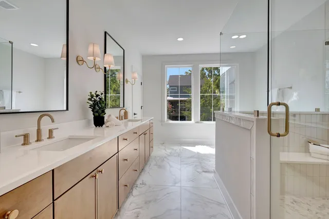 a view of a patio with couches and potted plants