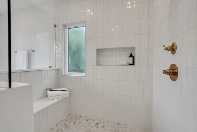 a picture of floor with a bench