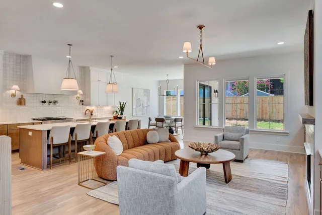 a spacious bathroom with a bathtub and shower