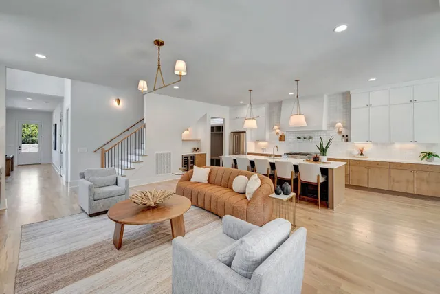 a view of a hallway with a wooden floor