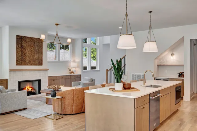a kitchen with a sink and cabinets