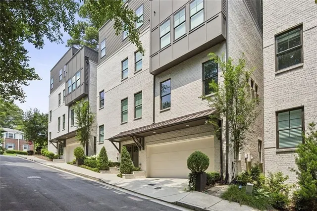 a front view of a multi story residential apartment building