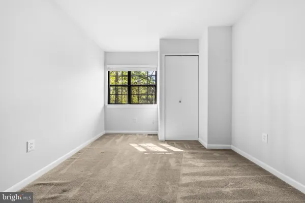 a view of balcony with a floor to ceiling window