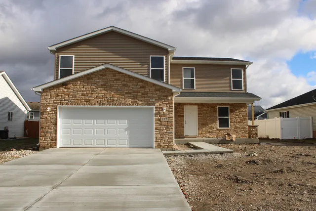 a front view of house with yard