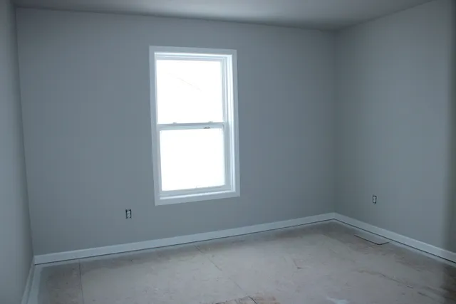 an empty room with a window